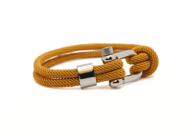 Yellow braided bracelet with silver stainless steel clasp