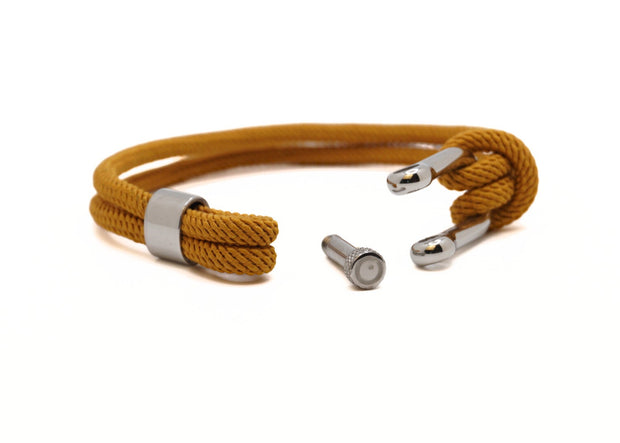 Yellow braided bracelet with silver stainless steel clasp