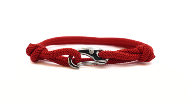 Red rope bracelet with a silver stainless steel clasp